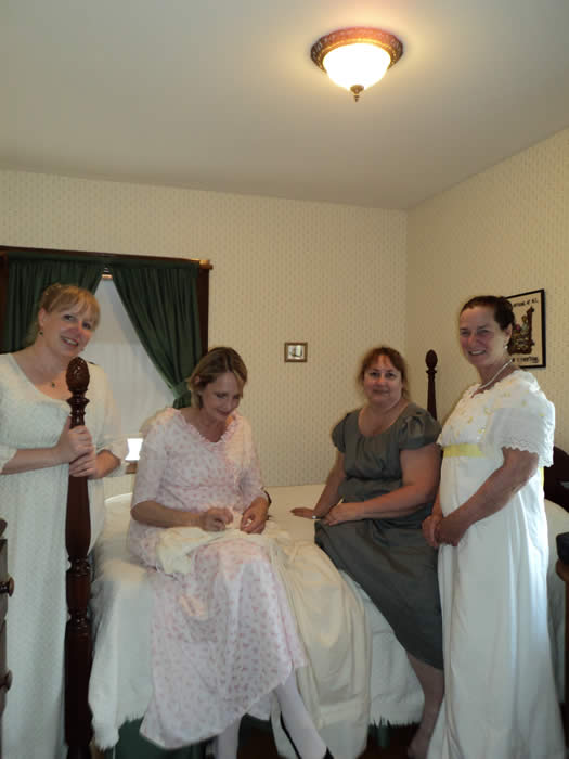 Last-minute sewing on Regency costumes at a Jane Austen weekend