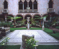 Courtyard inside a Venition-style mansion with gardens and balconies