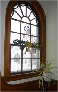 Congregational Church in Hyde Park through a window at The Governor's House, a Vermont Bed & Breakfast