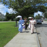 group of ladies in Regency attire taking a walk