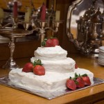 small wedding cake decorated with strawberries